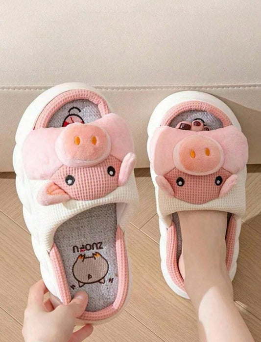 Women's pig design slippers.